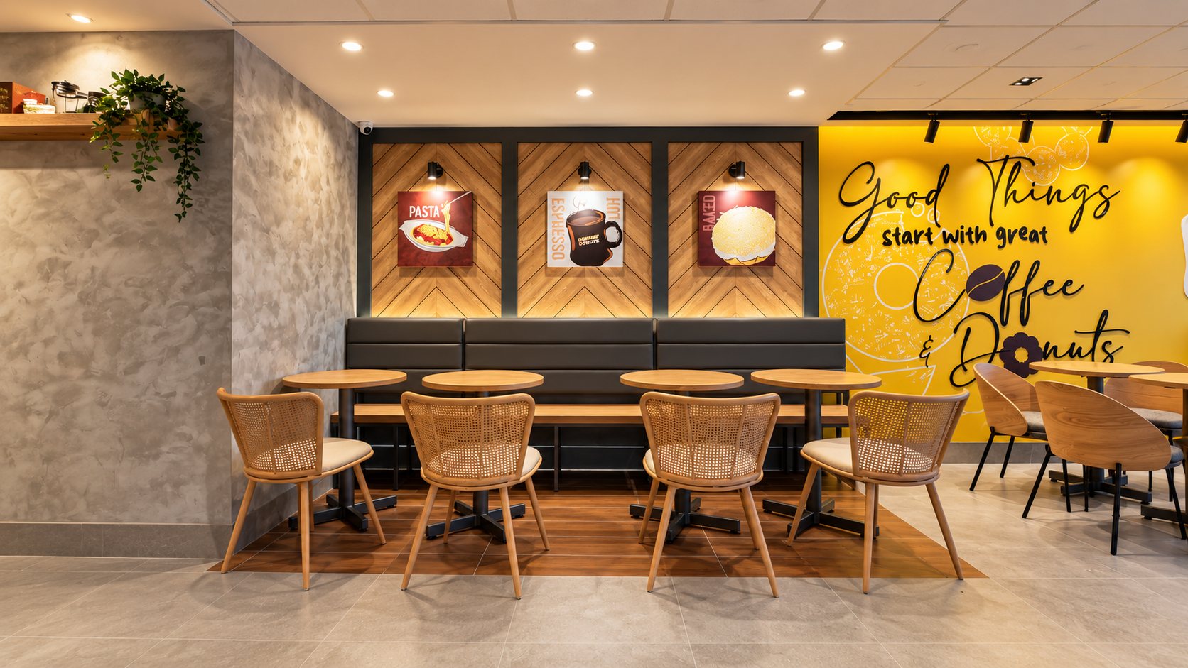 Restaurant dining area with rattan chairs, banquette seating, and a feature wall, Makati City